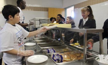 Faith, service fuel Holy Cross group's efforts