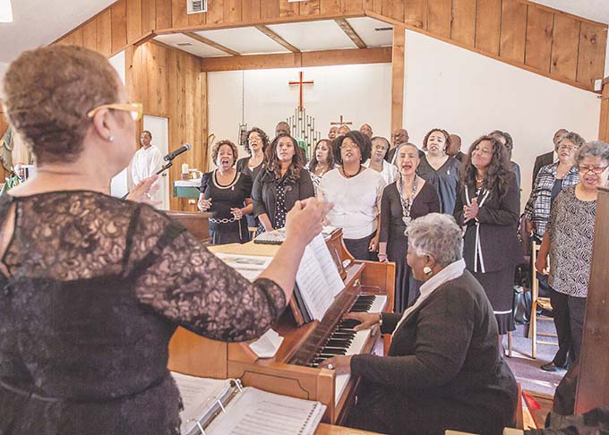 The choir sings during Mass at St. Anthony Catholic Church on their 75th anniversary in Dallas, Sunday, Oct. 6, 2013. (Ron Heflin/Special Contributor)
