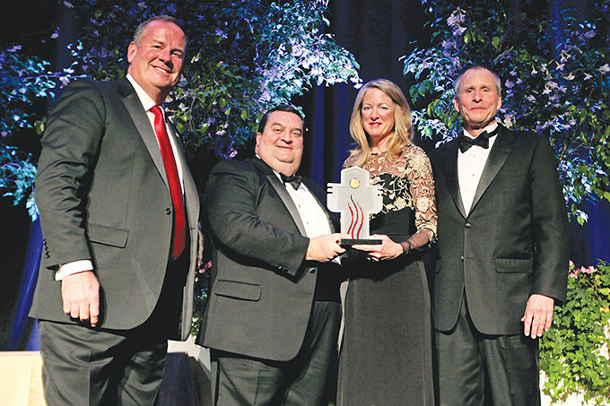 The Catholic Foundation award winners Mary Terry and Mike Terry with the foundation's CEO and president Matt Kramer, during the 32nd annual Catholic Foundation award dinner, on Friday, Feb. 07, 2014 at the Hilton Anatole in Dallas. (BEN TORRES/Special Contributor)