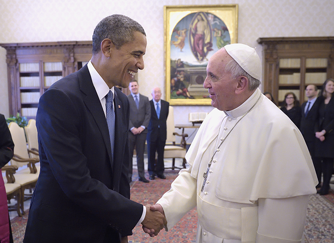 U.S. President Barack Obama shakes hands with Pope Francis during a private audience at the Vatican March 27. (CNS photo/Stefano Spaziani)