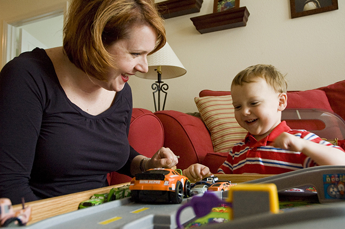 Bridget Golden and her 2-year-old son, Andrew, play with cars at their home last year in Hendersonville, Tenn.  (CNS photo/Theresa Laurence, Tennessee Register)