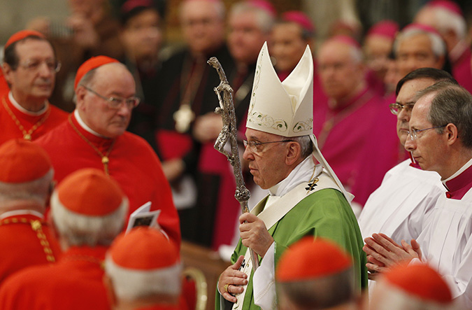 Pope Francis arrives to celebrate a Mass to open the extraordinary Synod of Bishops on the family in St. Peter's Basilica at the Vatican Oct. 5. (CNS photo/Paul Haring)