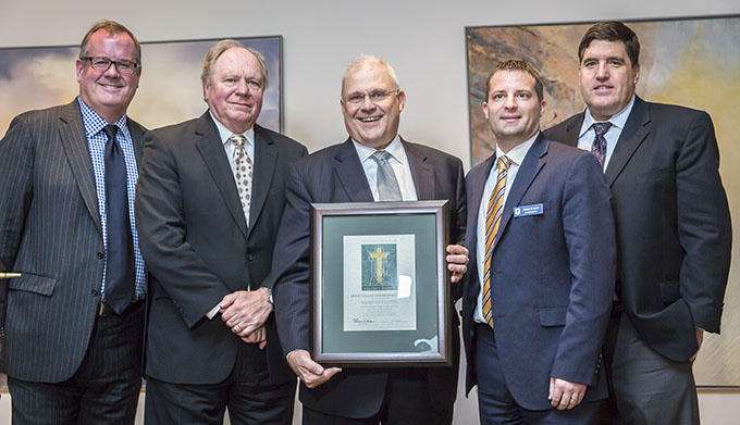 A grant to Jesuit College Preparatory school to replace a 42-passenger bus. Pictured are, from left Matt Kramer, president and CEO of The Catholic Foundation, Bob Berg, trustee, Michael Earsing, president, James Kramer, development director and John Landon, trustee, at the Catholic Foundation Grant Awards luncheon at the Museum of Biblical Art in Dallas, Thursday, Nov. 13, 2014. (Ron Heflin/Special Contributor)