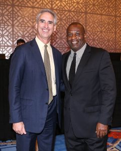 Keynote speaker Oliver Luck and Bishop Dunne Athletic Director Kenneth Davis at the Bishop Dunne 100 Dinner on Oct. 22. (DON JOHNSON/Special Contributor)