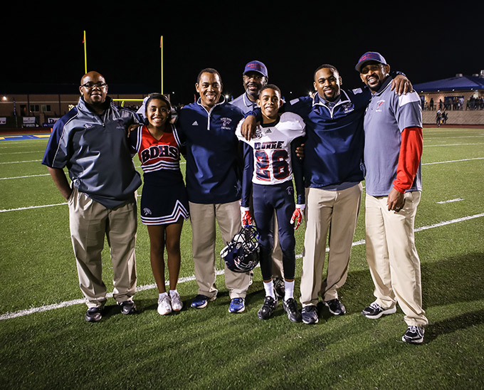 From left, Bishop Dunne Catholic School Coach John Johnson, Alesia Johnson, Coach Walter Johnson Jr., Ron Johnson, Walter Johnson III, Head Coach Michael Johnson and David Johnson share a family bond of faith and football. (DON JOHNSON/Special Contributor)