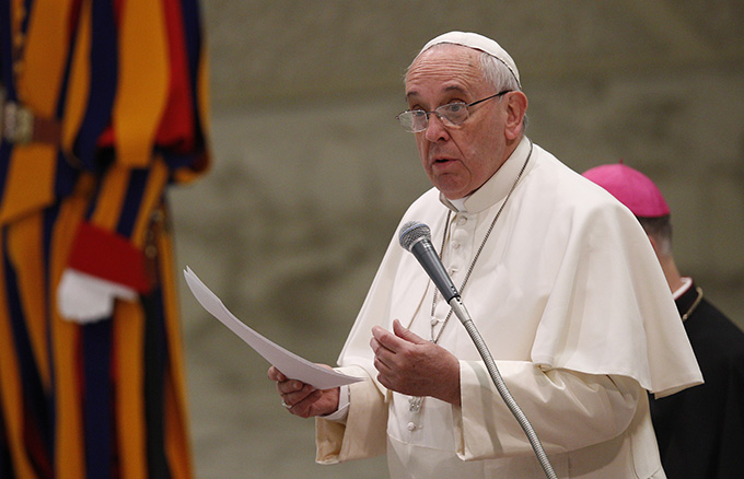 Pope Francis speaks as he leads his general audience in Paul VI hall at the Vatican Jan. 28. (CNS photo/Paul Haring)