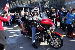 Bishop Kevin J. Farrell, left, waves from a Harley Davidson motorcycle at the start of the North Texas March for Life on Jan. 17. (BEN TORRES/Special Contributor)
