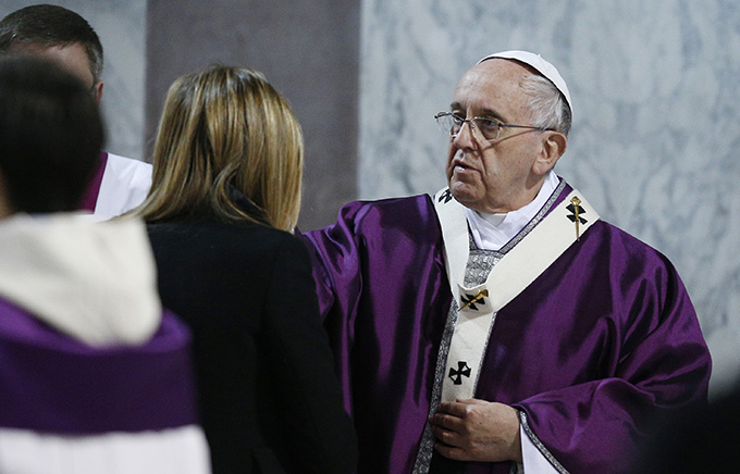 Pope Francis gives ashes during Ash Wednesday Mass at the Basilica of Santa Sabina in Rome Feb. 18. (CNS photo/Paul Haring)