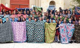 Students craft blankets for children in need