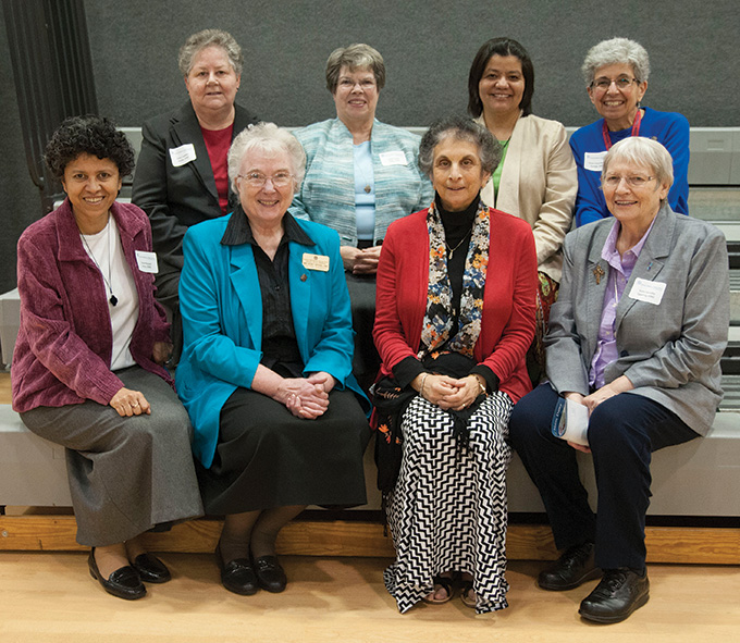 Members of the School Sisters of Notre Dame, front from left, Sister Raquél Ortiz of St. Louis, Sister Mary Delbert Weisensel, Sister Theresa Khirallah and Sister Dorothy Eggering; back from left, Sister Juliette Daigle, Sister Dawn Achs, Sister Beatriz Martinez-Garcia and Sister Carol George. (JENNA TETER/The Texas Catholic)