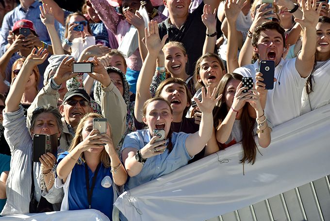 Young people cheer as Pope Francis arrives to celebrate Mass and the canonization of Junipero Serra outside the Basilica of the National Shrine of the Immaculate Conception in Washington Sept. 23. (CNS photo/Matthew Barrick)