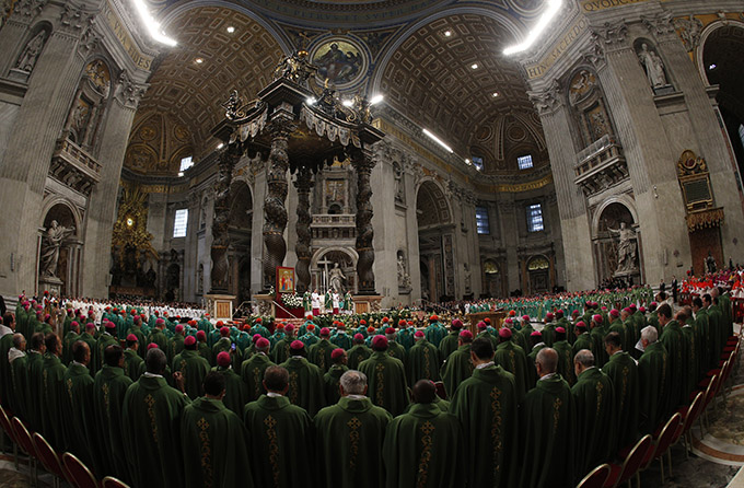 Pope Francis and members of the Synod of Bishops on the family concelebrate the opening Mass of the synod in St. Peter's Basilica at the Vatican Oct. 4. (CNS/Paul Haring)