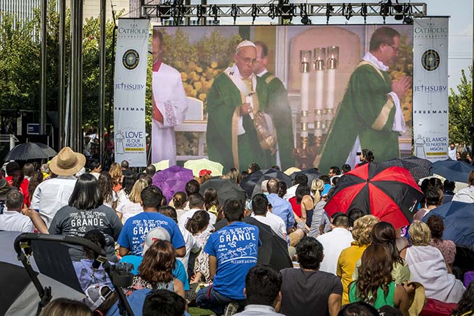 Pope Francis on the screen during the televised Mass celebrated by Pope Francis from Philadelphia and shown at Dallas' Klyde Warren Park Sunday, Sept. 27, 2015 (Ron Heflin/Special Contributor)
