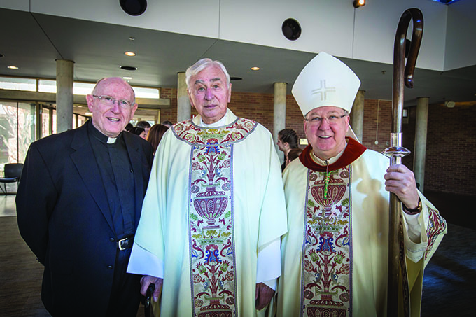 Bishop Kevin J. Farrell poses with Father Tom Clohery and Msgr. James Balint, the first pastor at Prince of Peace, after the 25th anniversary Mass of Prince of Peace Catholic Church in Plano on Feb. 7. (RON HEFLIN/Special Contributor)