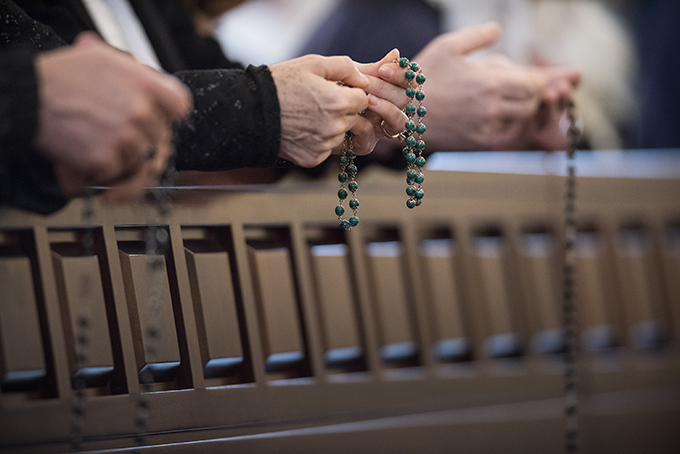 People pray the rosary at the the Shrine of the Most Blessed Sacrament in Hanceville, Ala. (CNS photo/Jeff Bruno, EWTN)