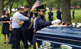Thousands gather to honor a fallen hero