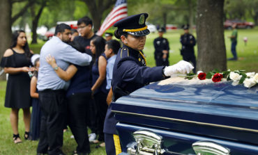 Thousands gather to honor a fallen hero