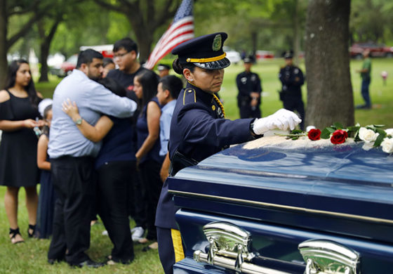 Thousands gather to honor a fallen hero