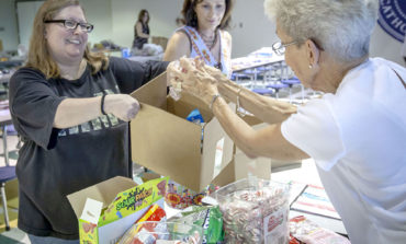 Prince of Peace group gathers care packages for troops
