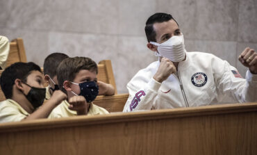 Olympian offers words of inspiration and faith at St. Mark Catholic School