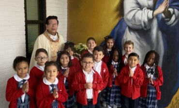 New mural highlights school’s faith, mission