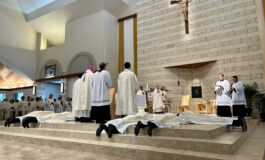 Bishop Burns ordains eight men to the priesthood