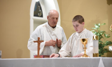 78-year-old altar server passes on love of the Eucharist to the younger generation